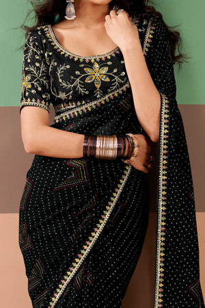 Charming Black Bandhani Printed Georgette Saree Adorned With Intricate Cording Embroidered Border