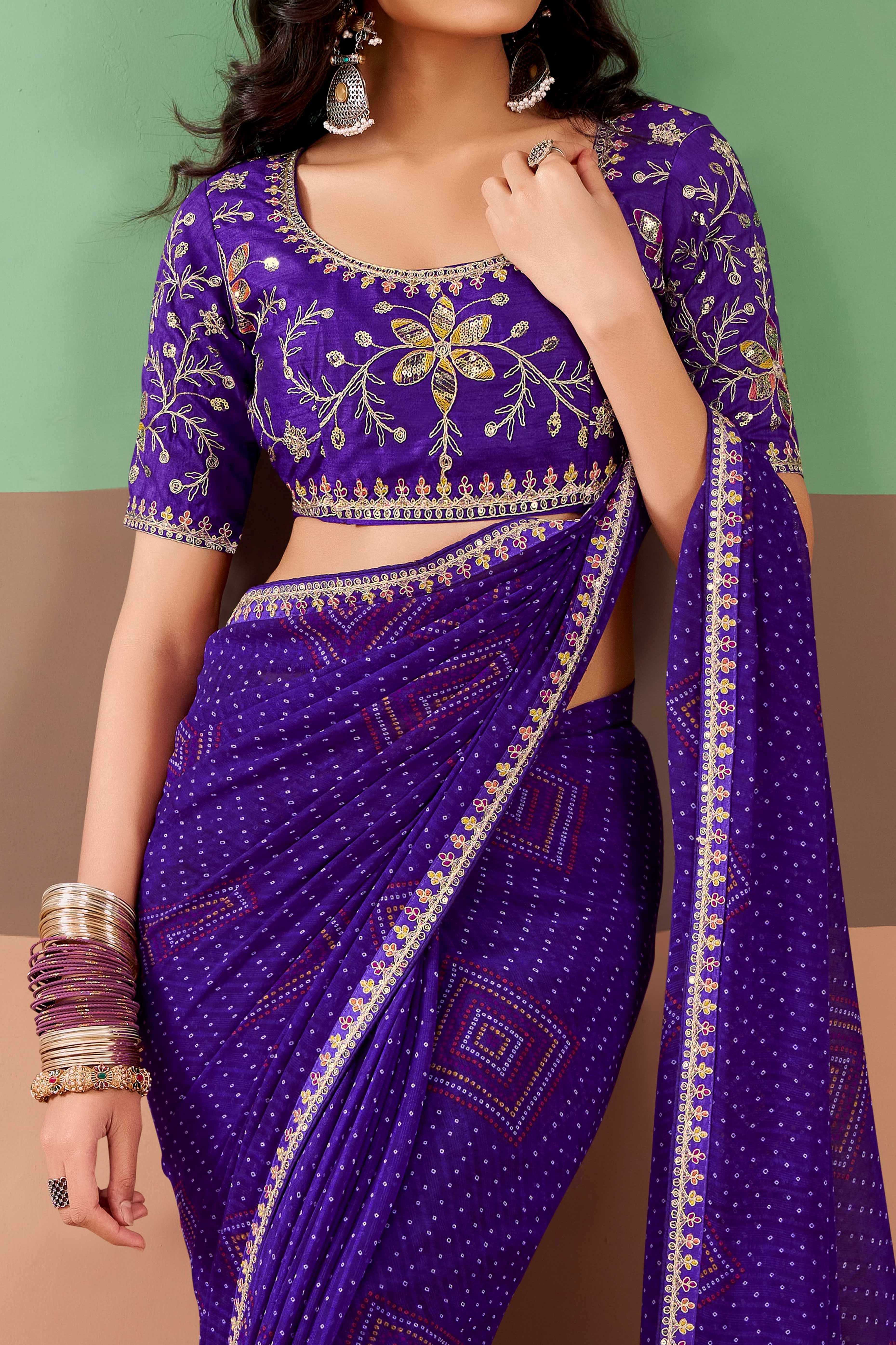 Charming Purple Bandhani Printed Georgette Saree Adorned With Intricate Cording Embroidered Border