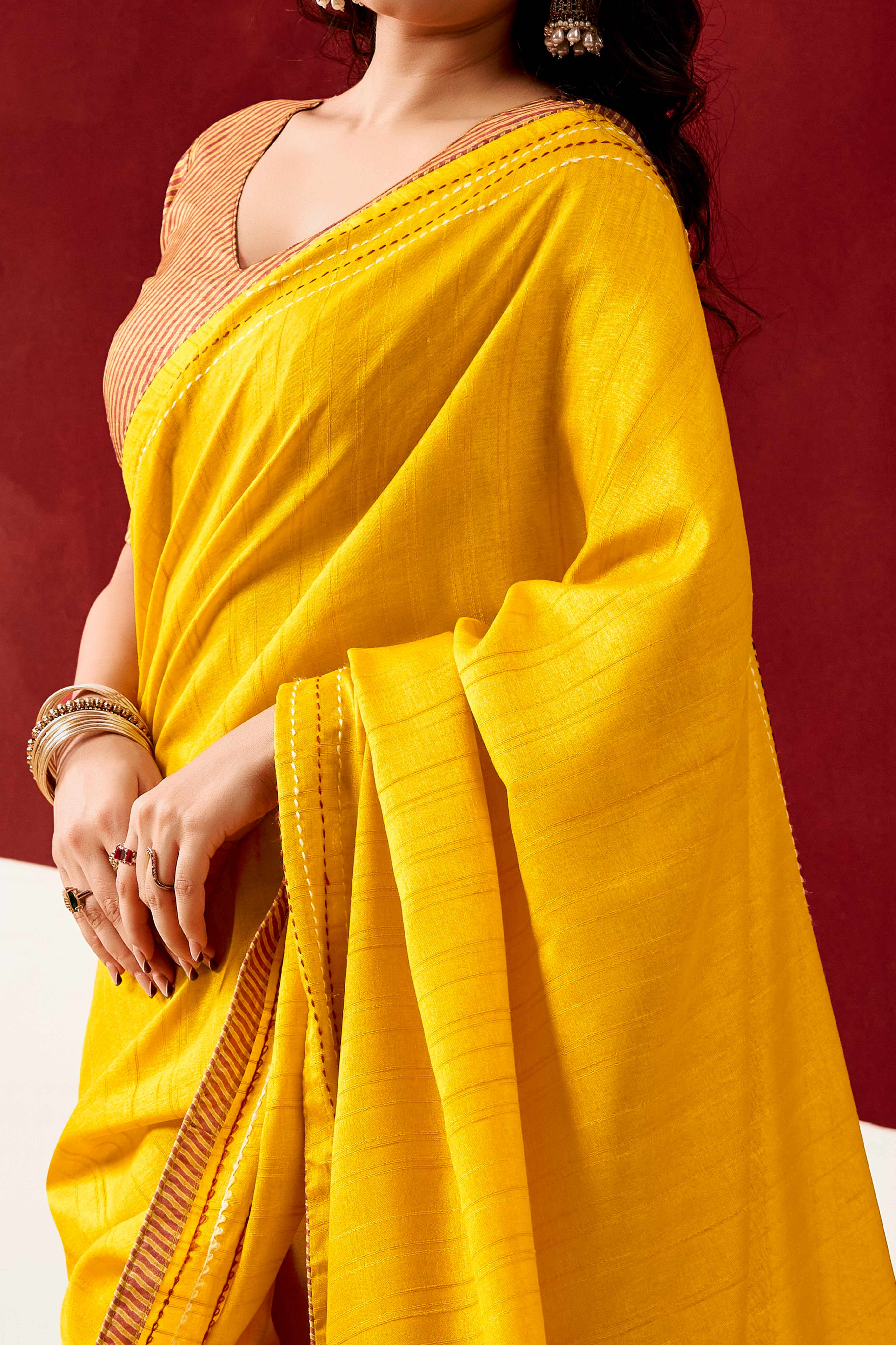 Graceful Yellow Handloom Cotton Blend Saree Featuring Striped Lining Embroidery & Tassel Pallu
