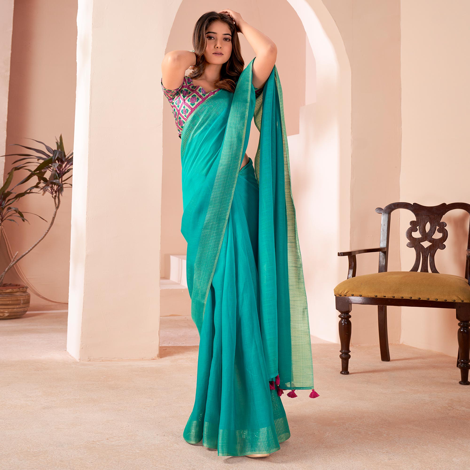 Turquoise Woven Linen Saree With Tassels