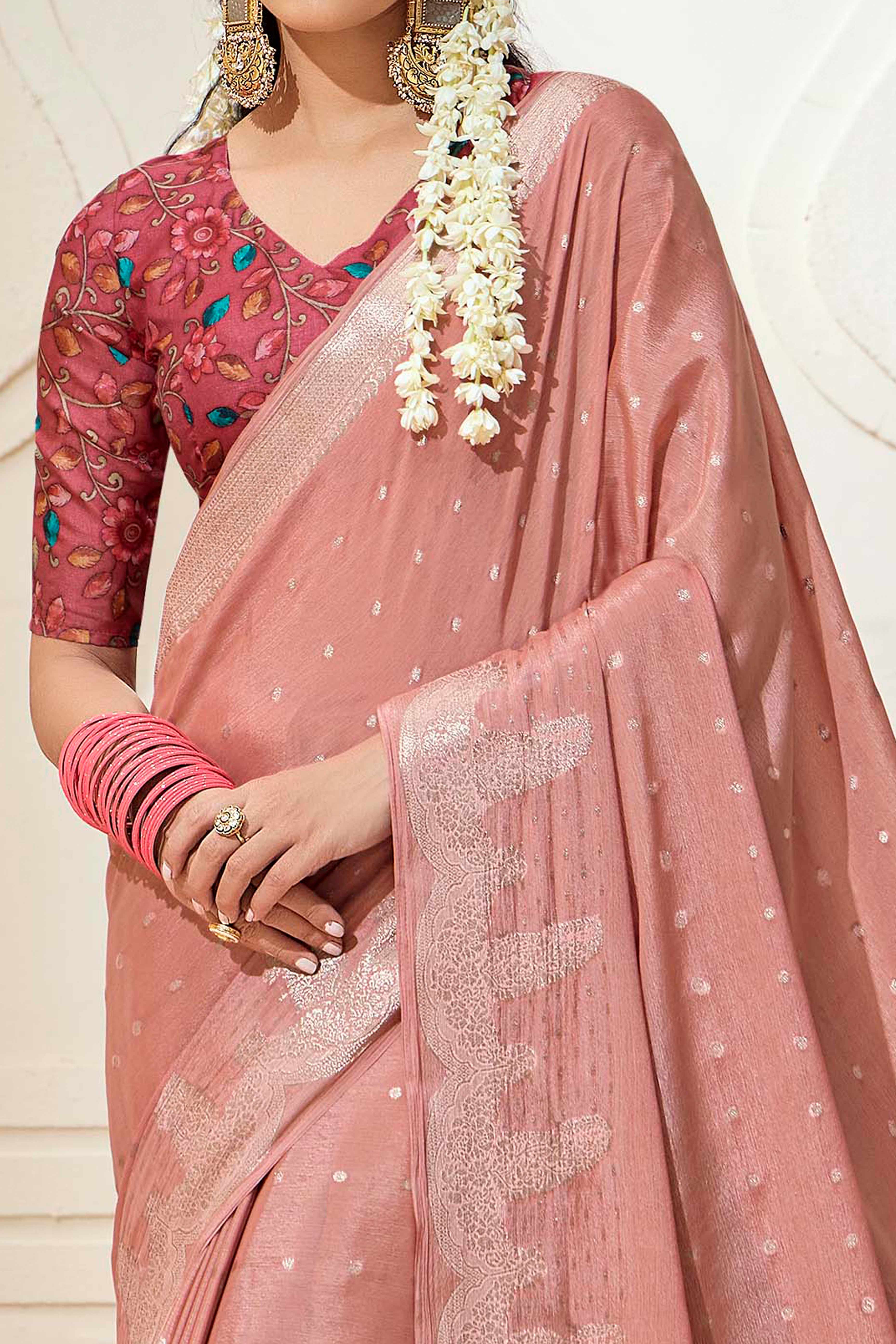 Peach Chinon Saree with Jacquard Weaving and Delicate Tassel Accents