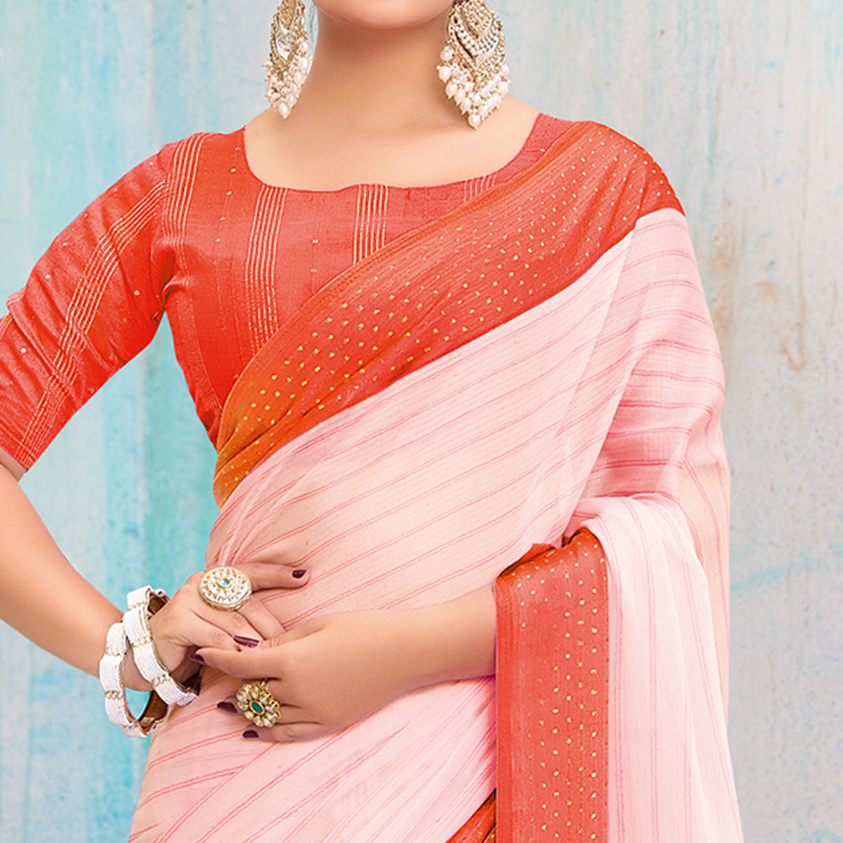 Coral Orange Printed Chiffon Saree With Weaving Border