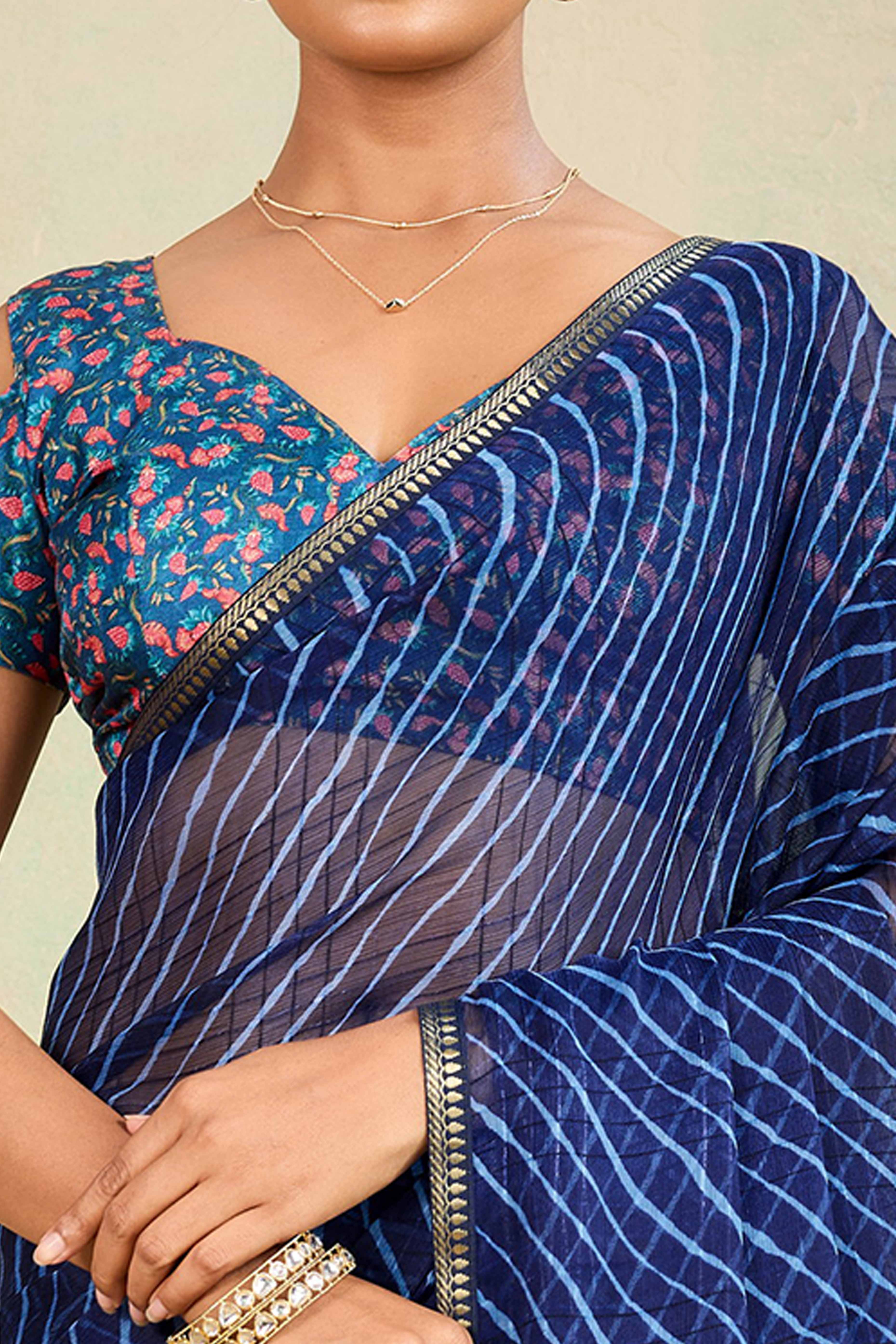 Blue Leheriya Chiffon Saree Accented With Elegant Zari Lace Border Work