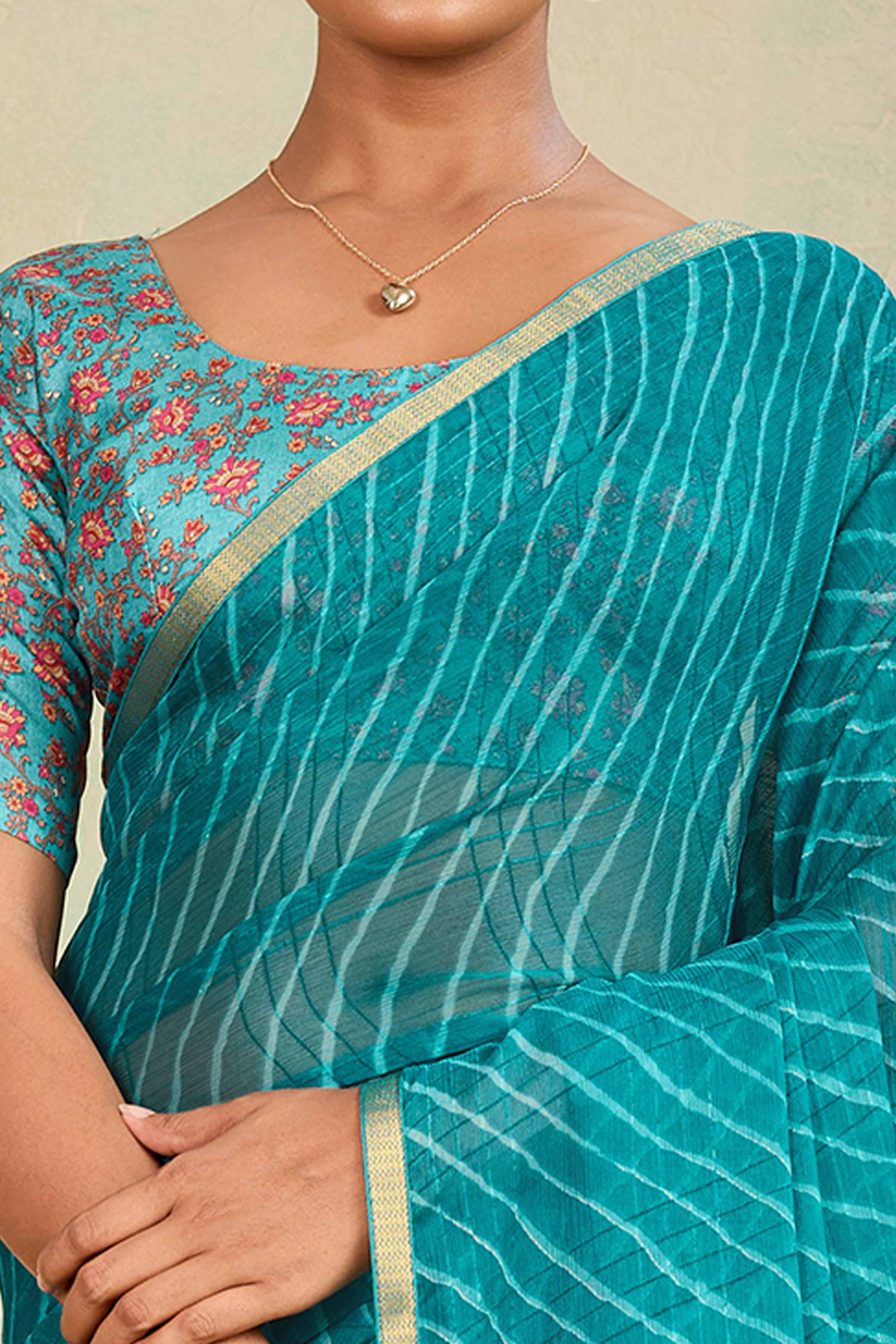 Teal Leheriya Chiffon Saree Accented With Elegant Zari Lace Border Work