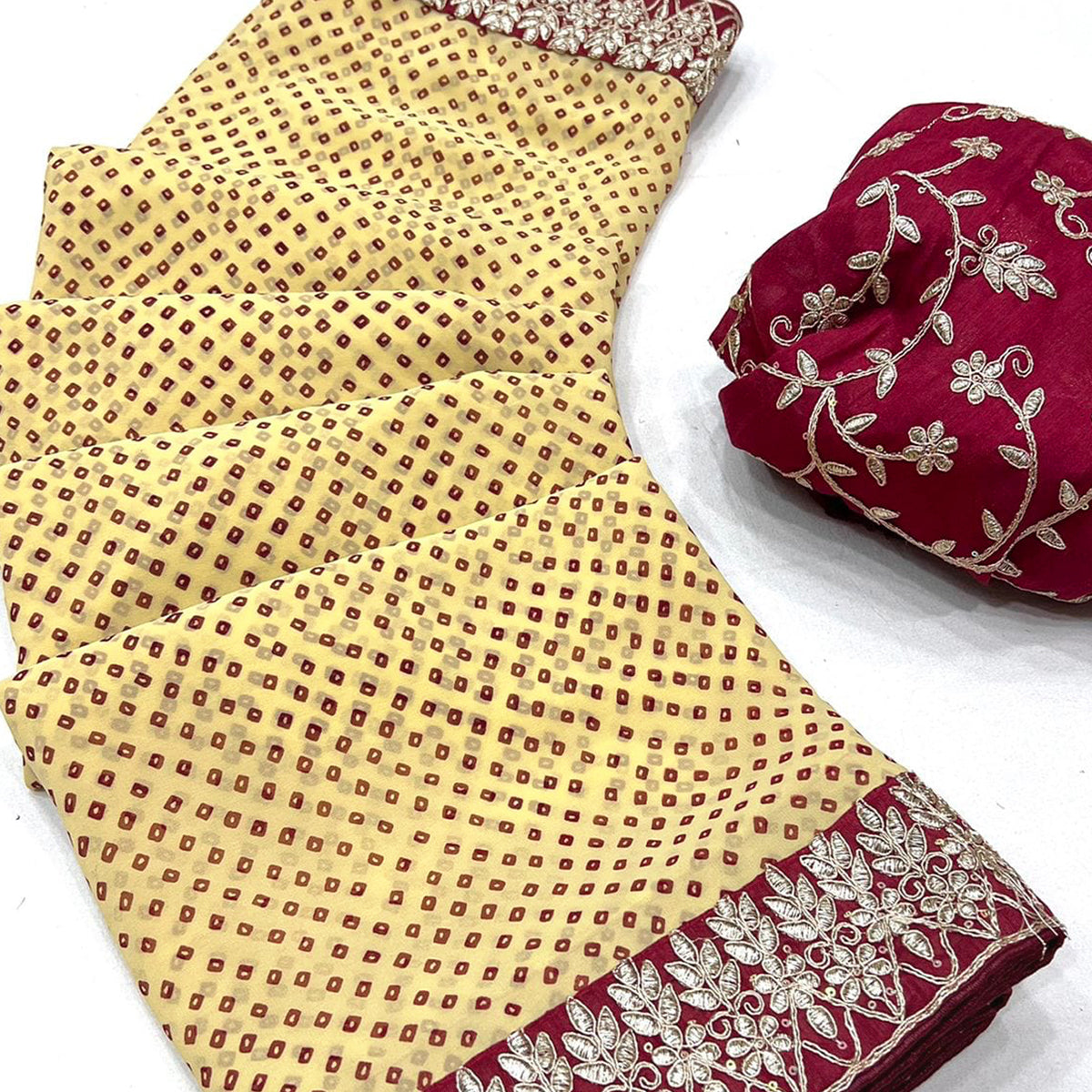 Cream Lightweight Georgette Saree Adorned with Classic Bandhani Prints and Lace Work