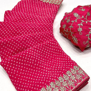 Pink Lightweight Georgette Saree Adorned with Classic Bandhani Prints and Lace Work