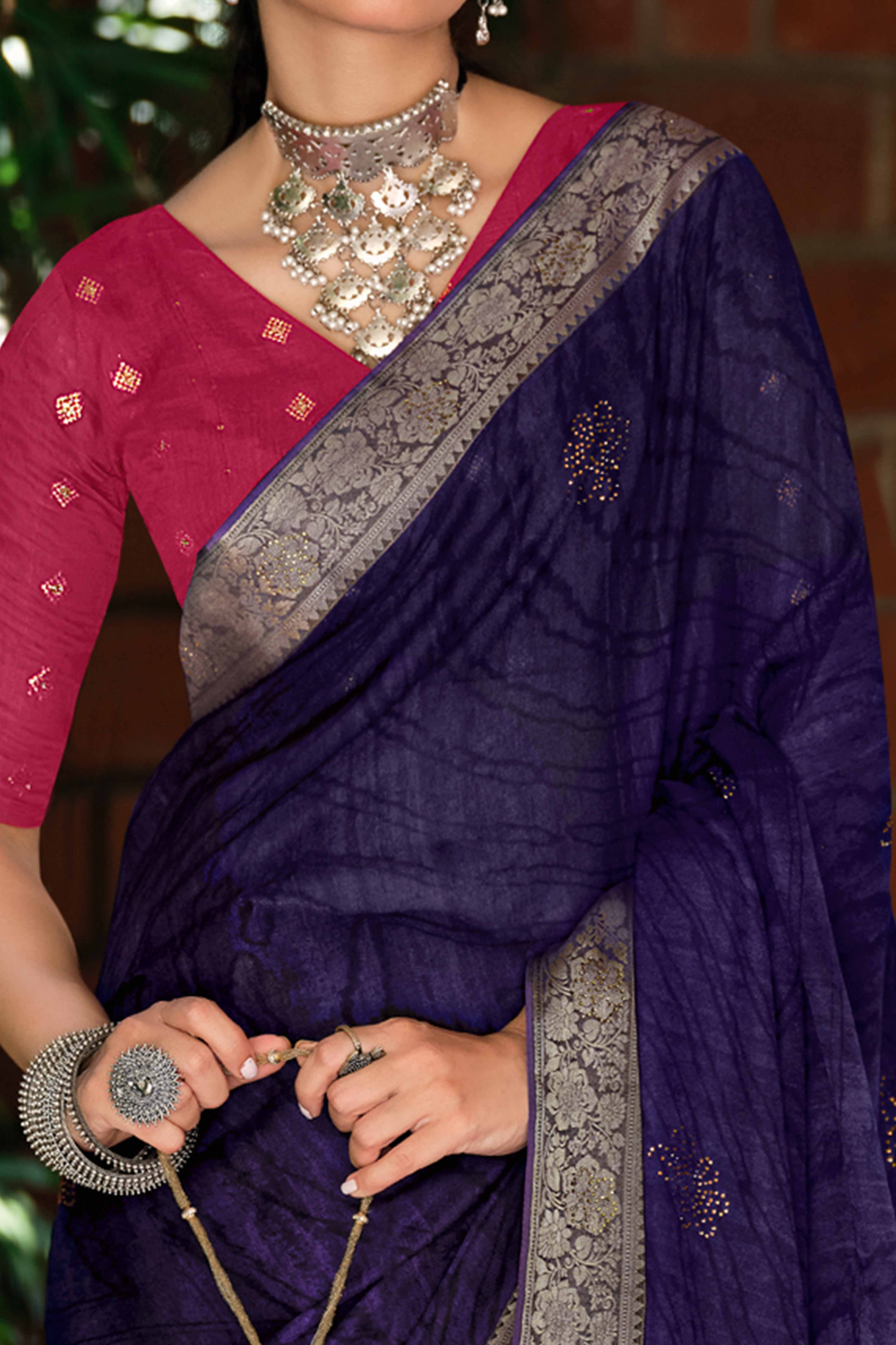 Blue Abstract Printed Georgette Saree Enhanced with Subtle and Shiny Stone Work