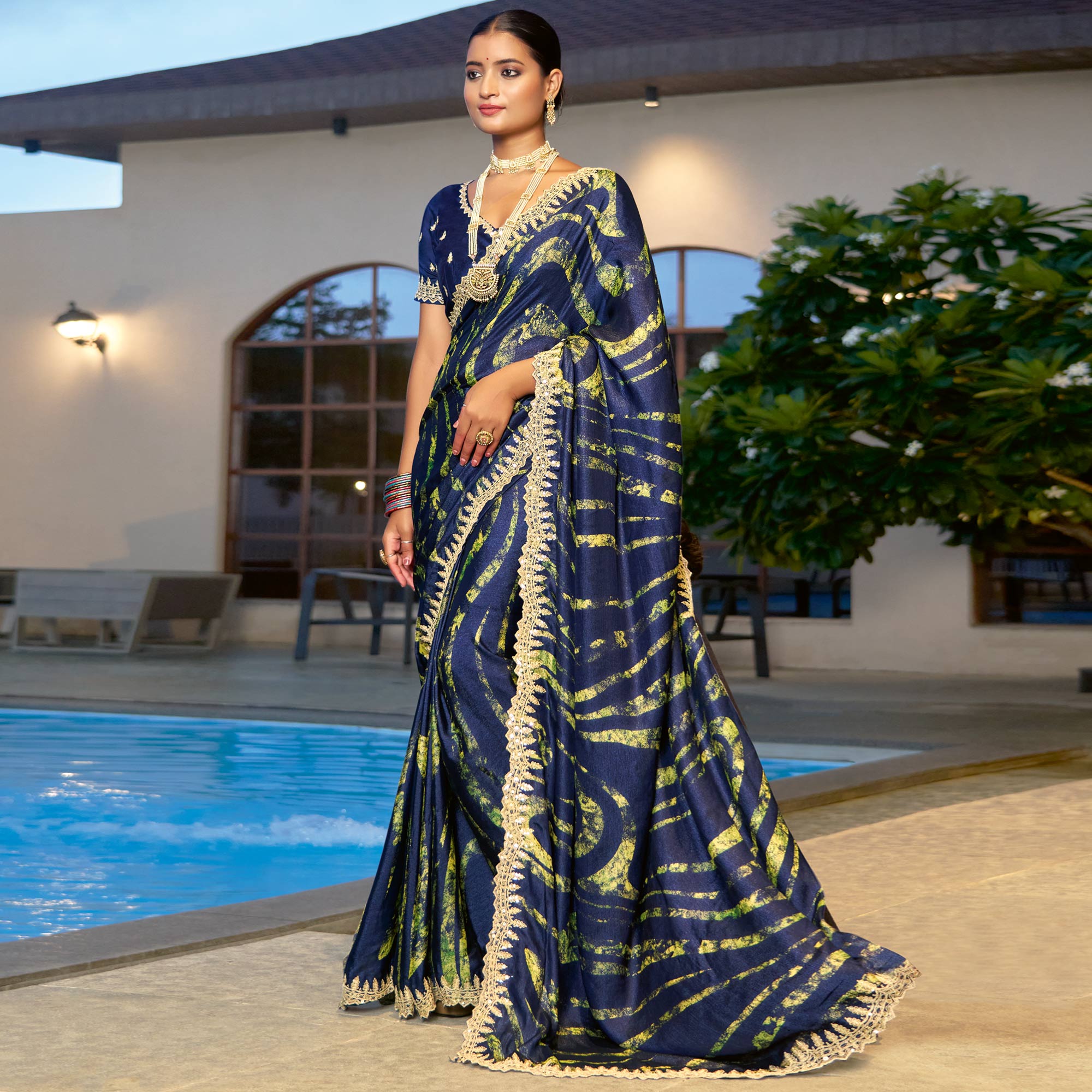 Blue Printed Chiffon Saree With Sequins Border