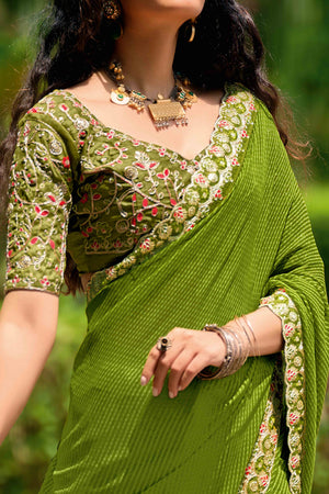 Green Striped Printed Georgette Saree With Shimmering Sequin Embroidered Border