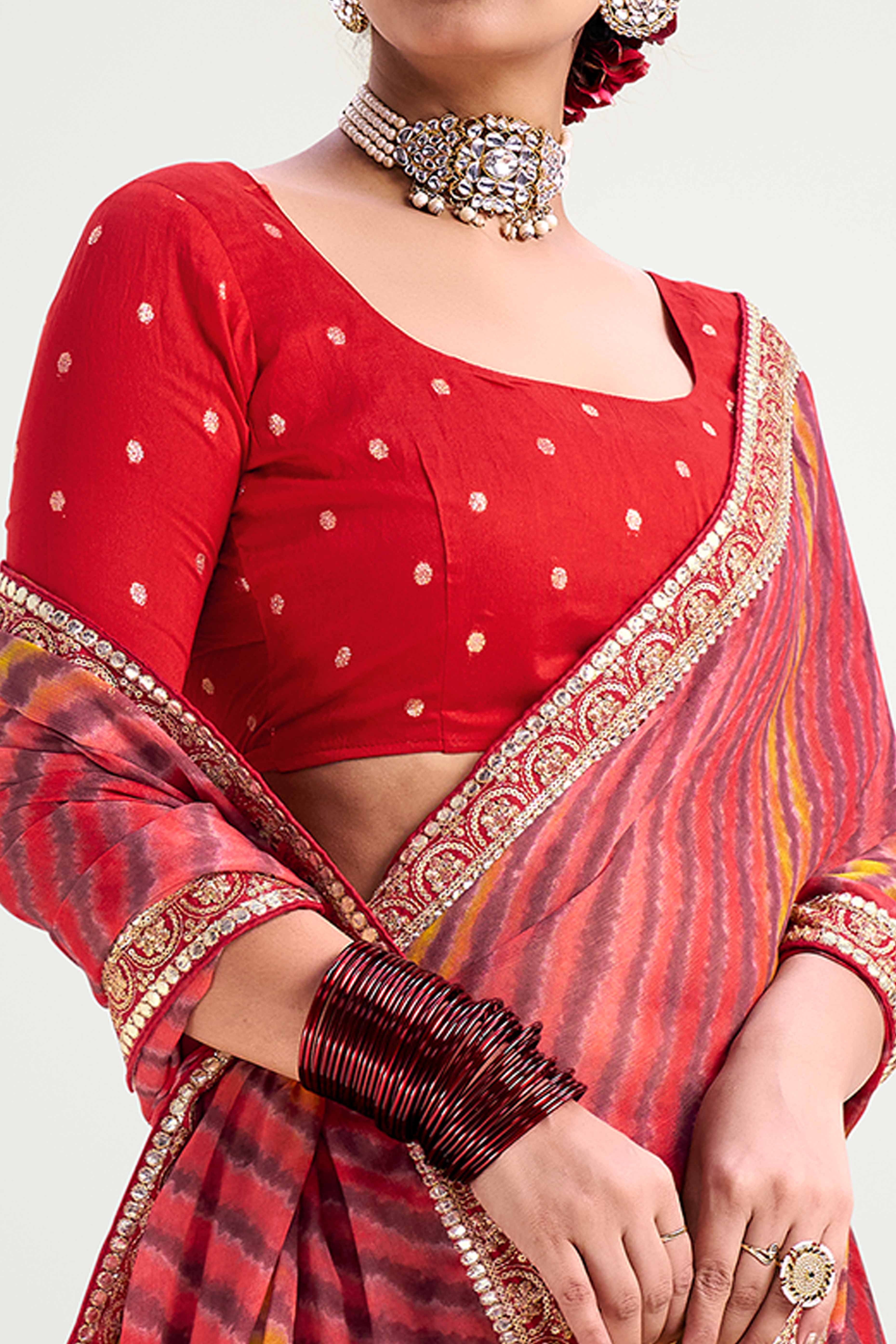Bright Red Striped Printed Chiffon Saree Enhanced With Sparkling Sequins Embroidered Border Work