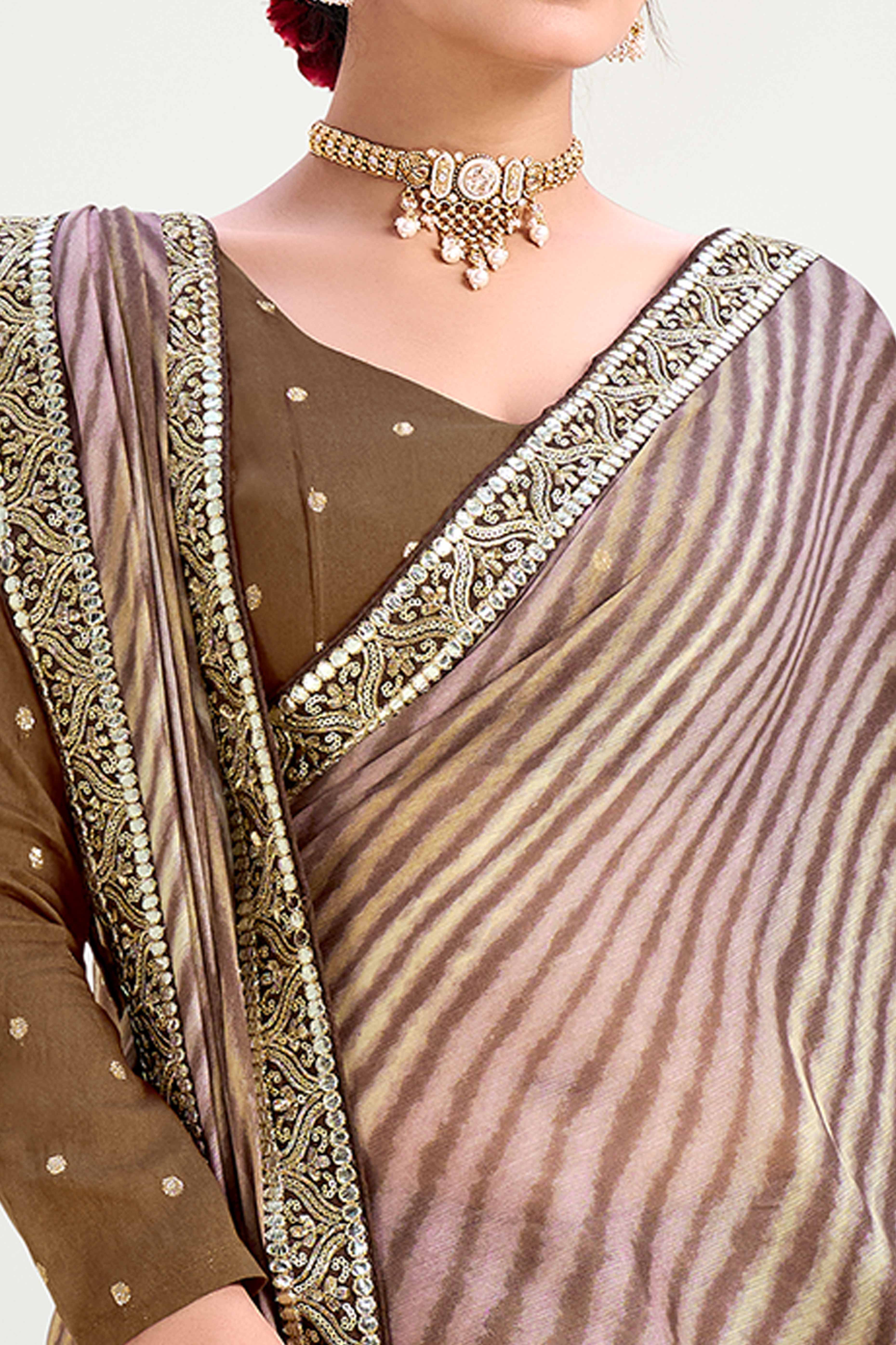 Brown Striped Printed Chiffon Saree Enhanced With Sparkling Sequins Embroidered Border Work