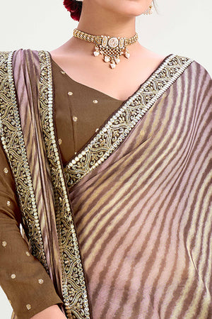 Brown Striped Printed Chiffon Saree Enhanced With Sparkling Sequins Embroidered Border Work