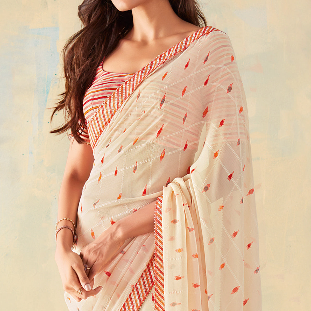 Off White Printed With Gota Patti Border Georgette Saree With Tassels
