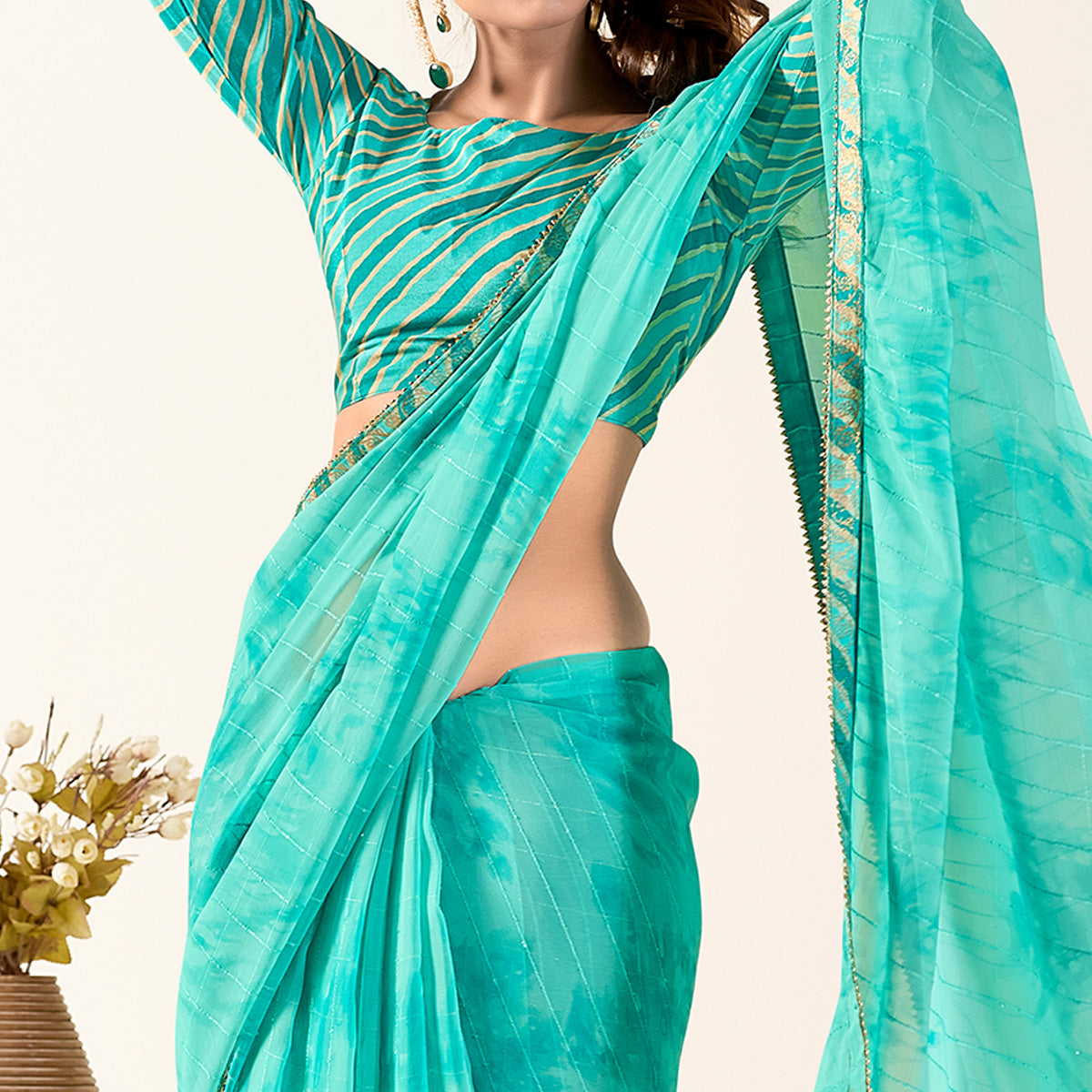 Turquoise Printed With Woven Georgette Saree With Tassels