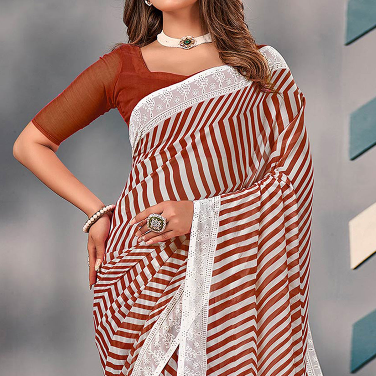 Rust Striped Printed Georgette Saree