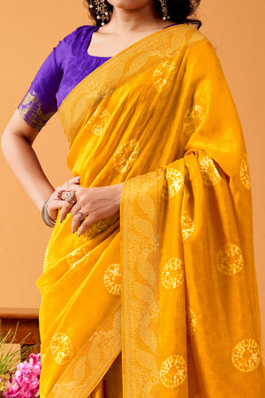 Luxurious Mustard Tussar Silk Saree Featuring Traditional Bandhani Print & Peacock Jacquard Border