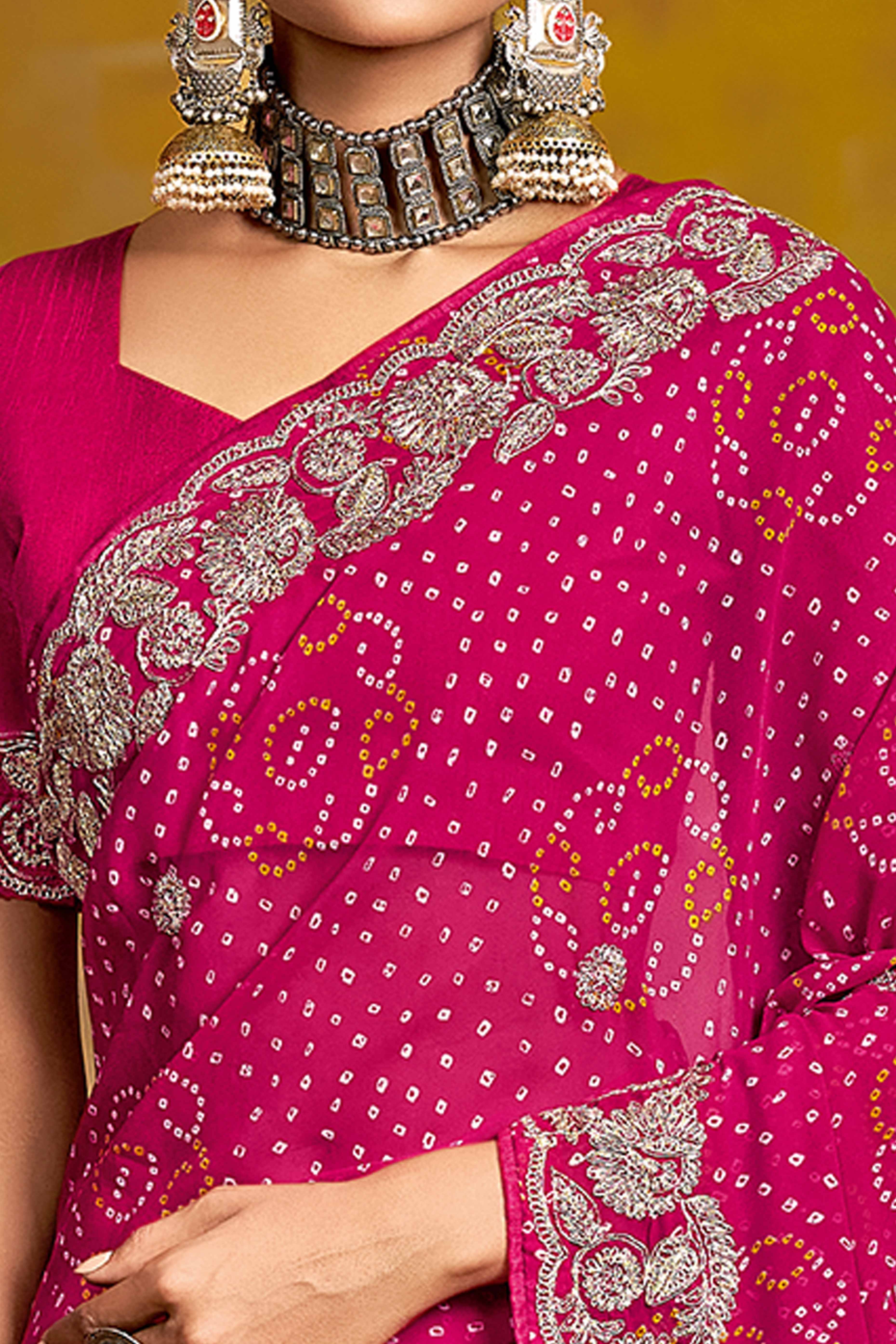 Pink Georgette Saree Adorned With Traditional Bandhani Prints & Intricate Floral Embroidery