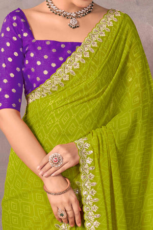 Modern Parrot Green Georgette Saree with Timeless Bandhani Prints