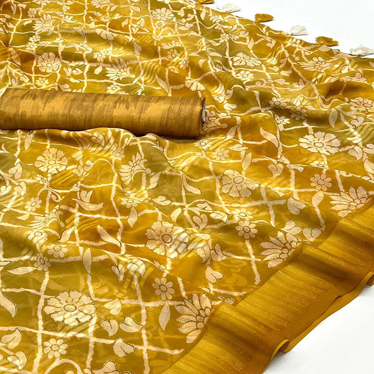 Mustard Floral Foil Printed Georgette Saree With Tassels