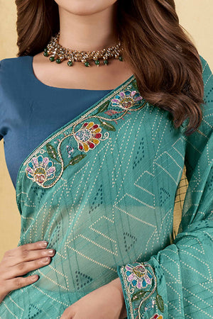 Turquoise Geometric Printed Chiffon Saree Accented With Floral Sequins Embroidered Border Work