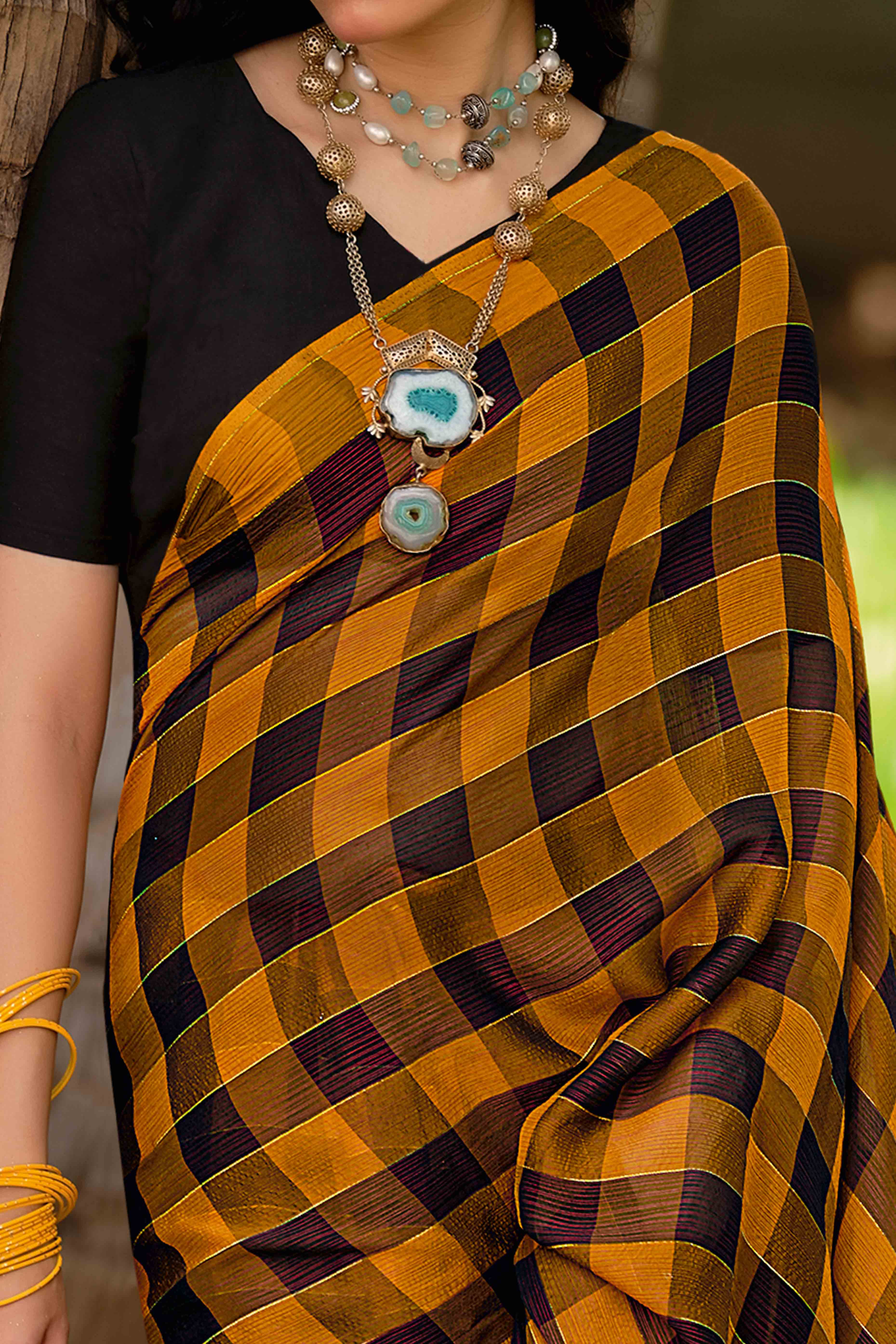 Ochre Orange With Intricate Black Weaving Checks Georgette Saree