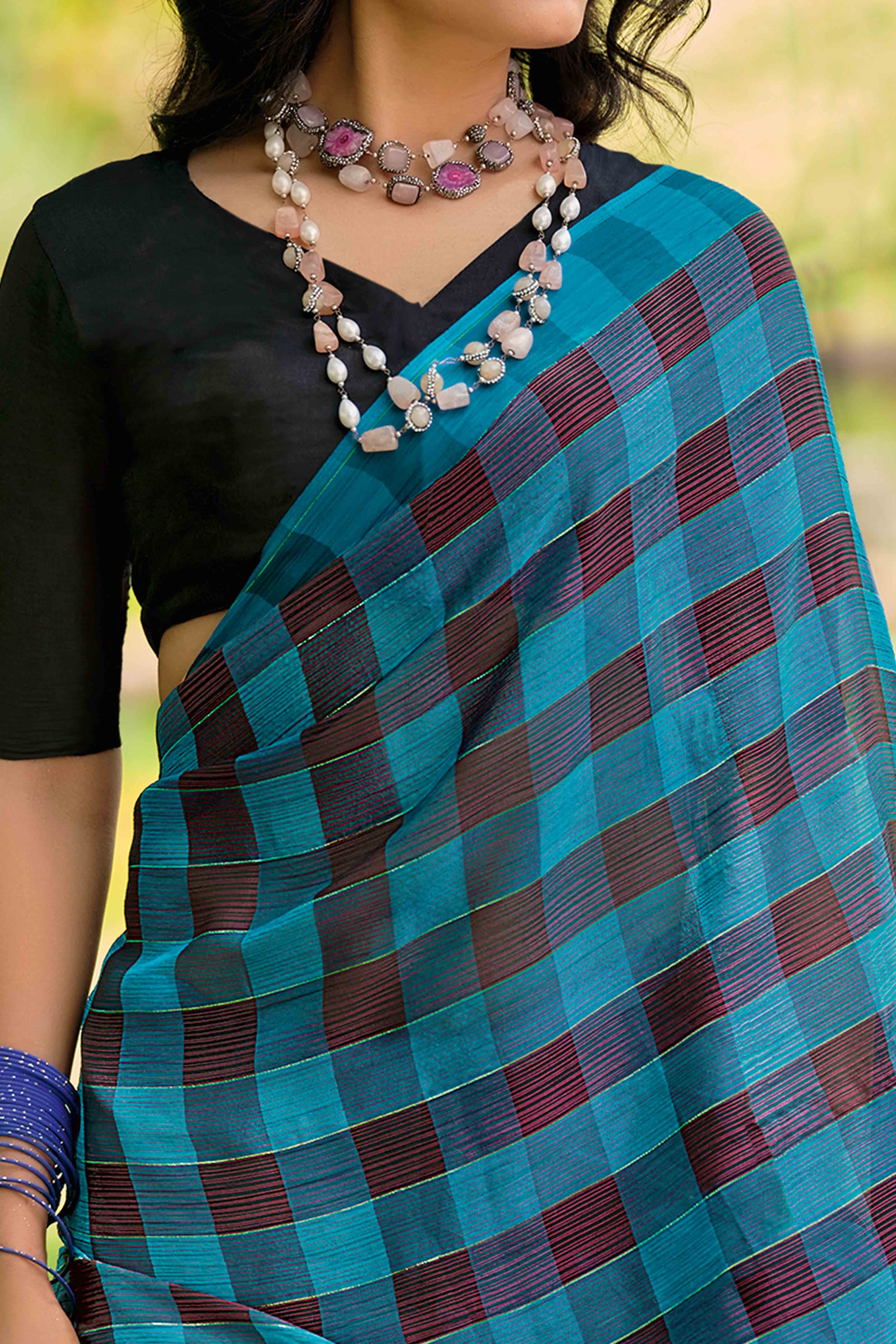 Sky Blue With Intricate Black Weaving Checks Georgette Saree