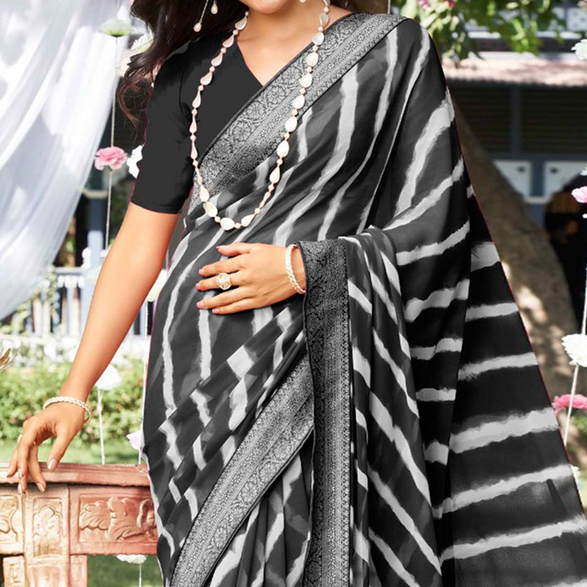 Black Leheriya Printed With Woven Border Georgette Saree