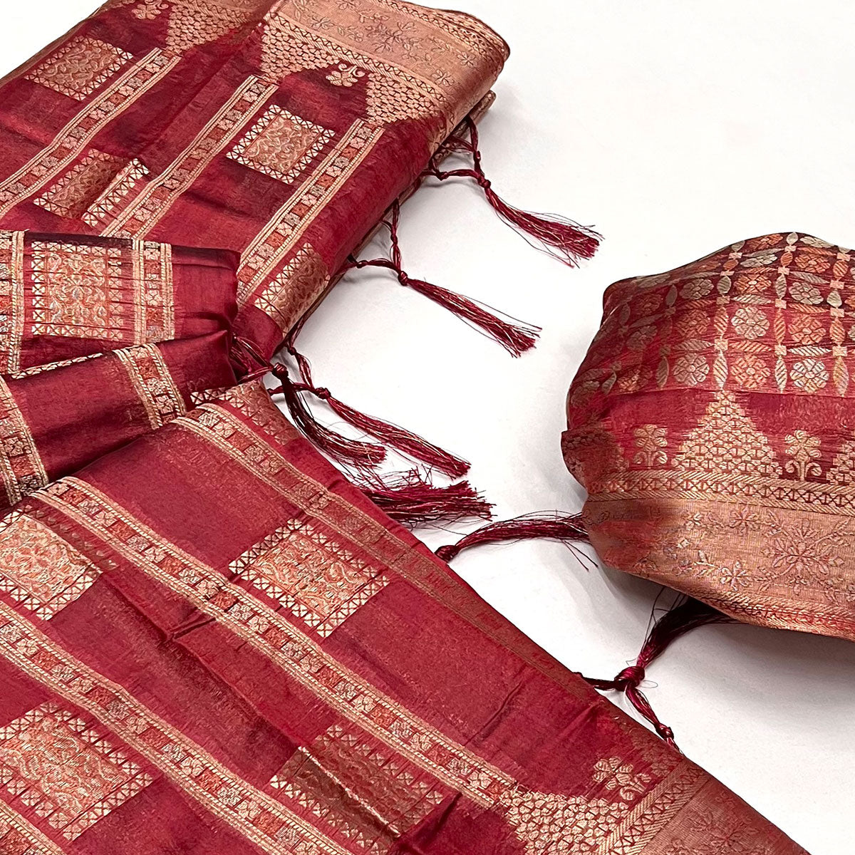 Red Woven Cotton Blend Saree With Tassels