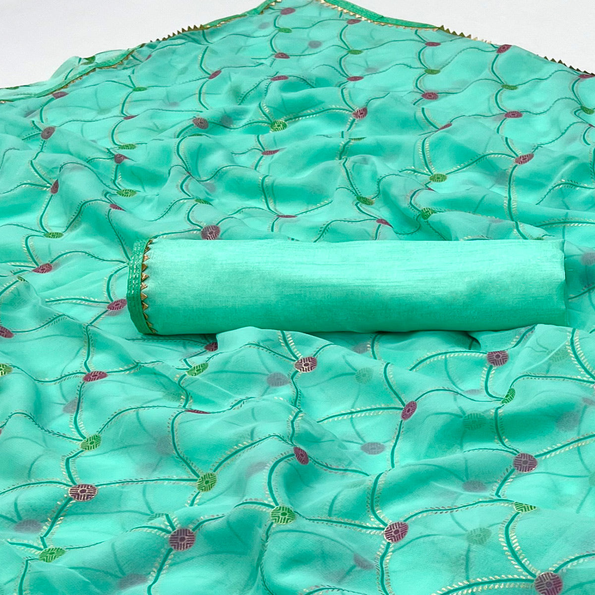 Turquoise Foil Printed Georgette Saree