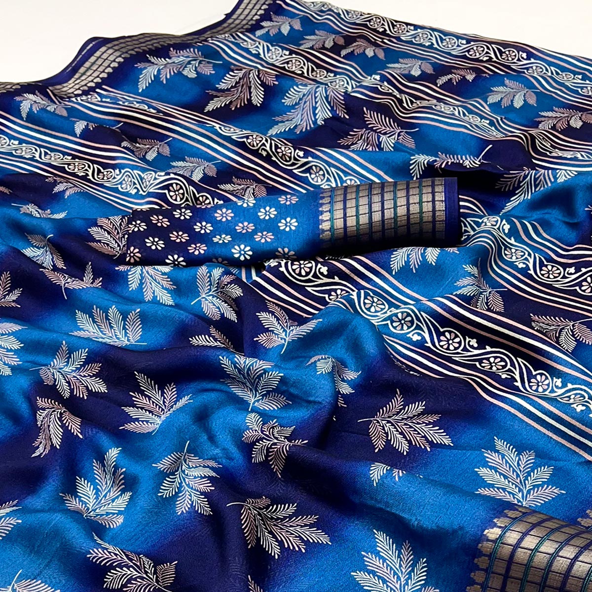 Blue Floral Printed Georgette Saree Featuring Weaving Border Design