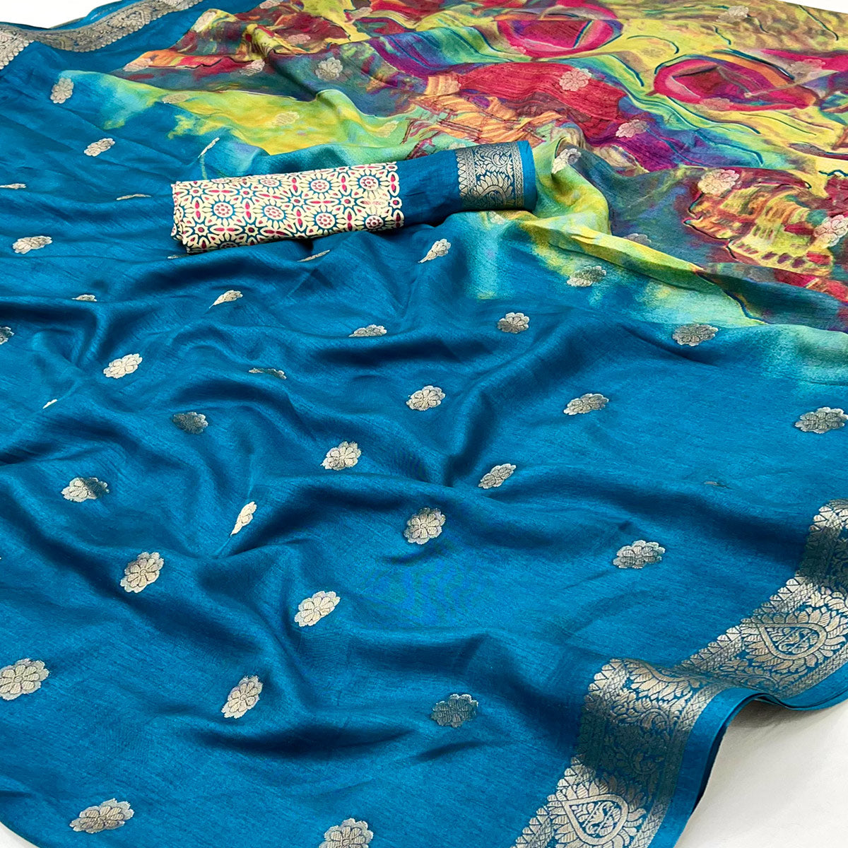 Soft Dola Silk Saree in Teal Glows with Intricate Floral Butti Weaving