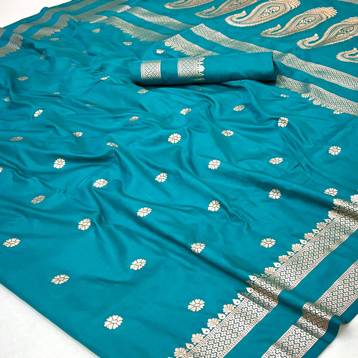 Rama Blue Ornate Floral Zari Weaving Work Silk Blend Saree With Festive Shine