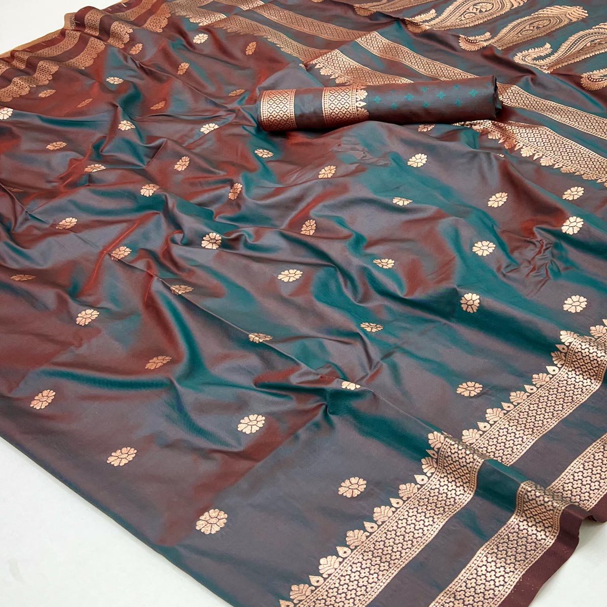 Teal Green Ornate Floral Zari Weaving Work Silk Blend Saree With Festive Shine