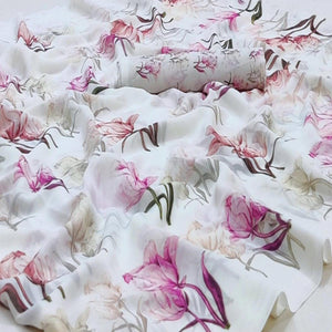 White Georgette Saree With Lightweight Drape And Dreamy Floral Motifs