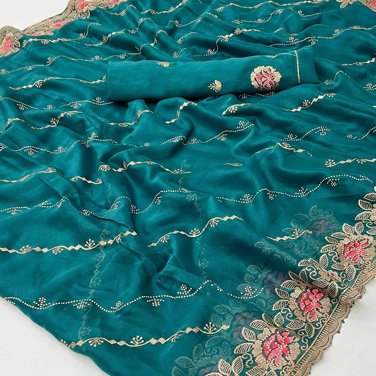 Graceful Teal Floral Thread & Zari Embroidered Georgette Saree