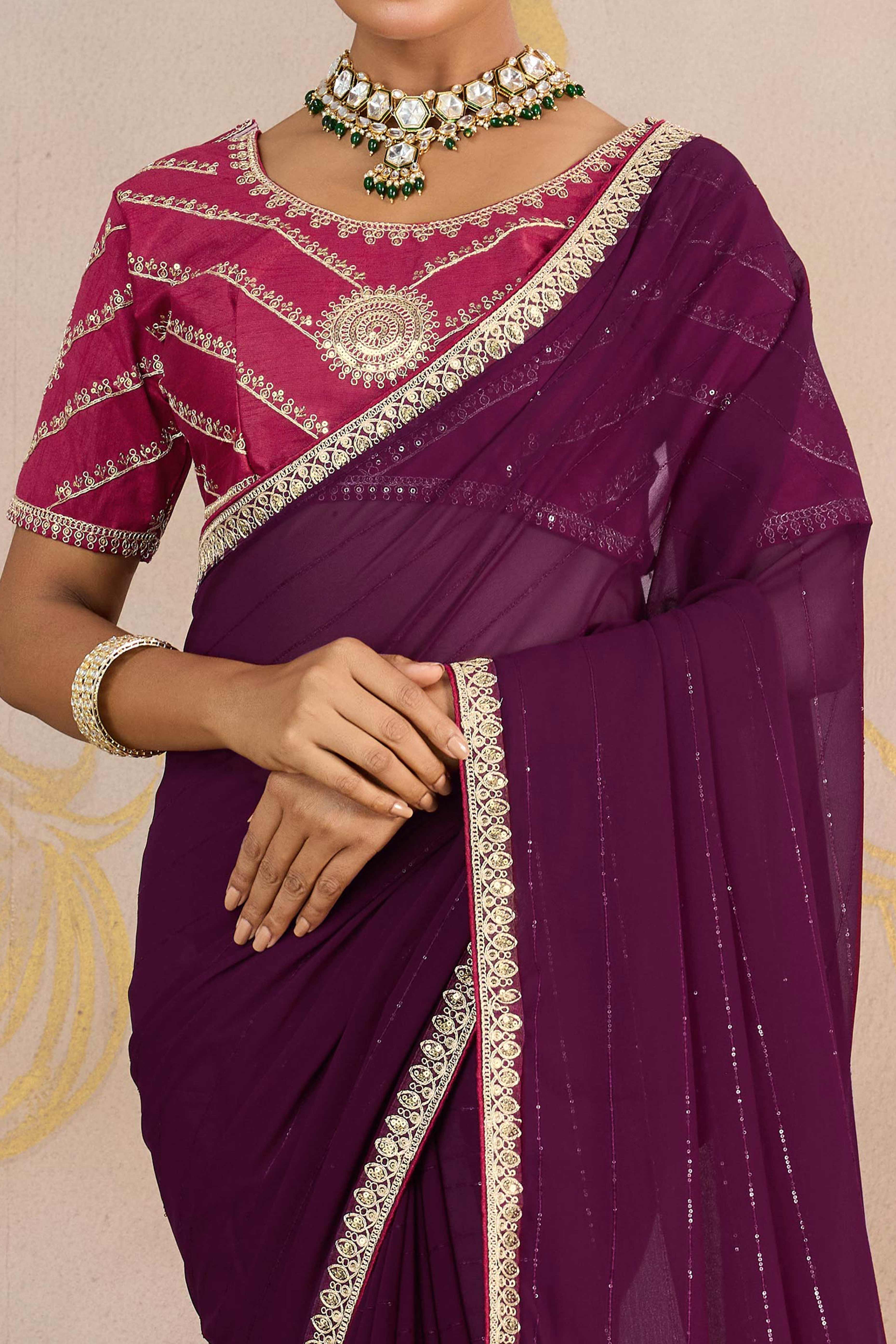 Wine Zari Embroidered Georgette Saree Accented With Sequins