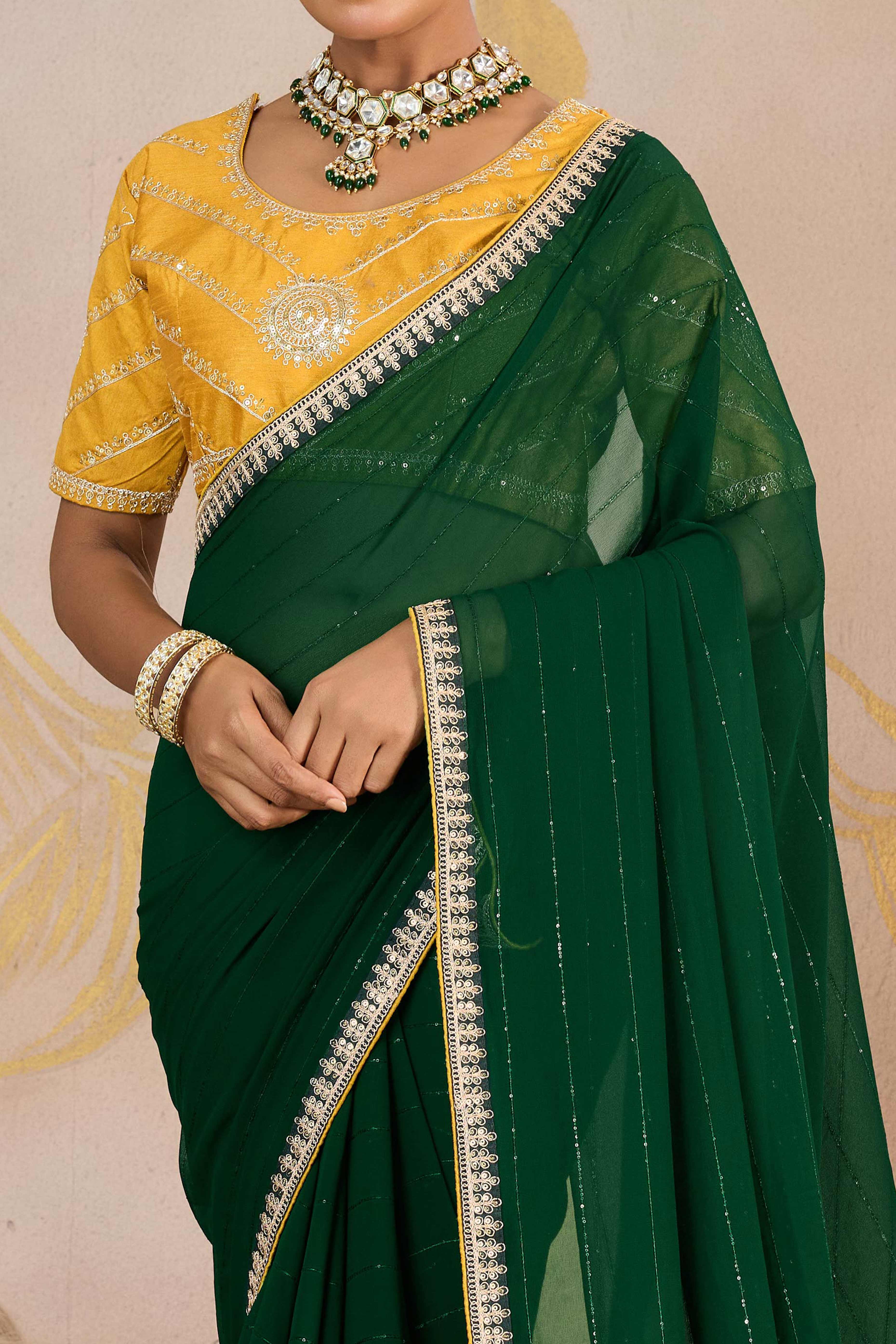 Green Zari Embroidered Georgette Saree Accented With Sequins