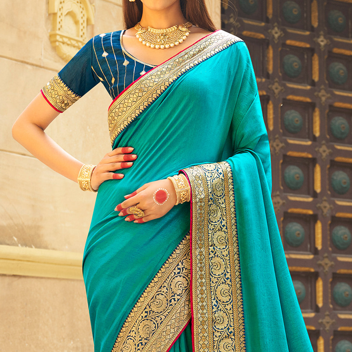 Rama Blue Solid With Embroidered Border Vichitra Silk Saree