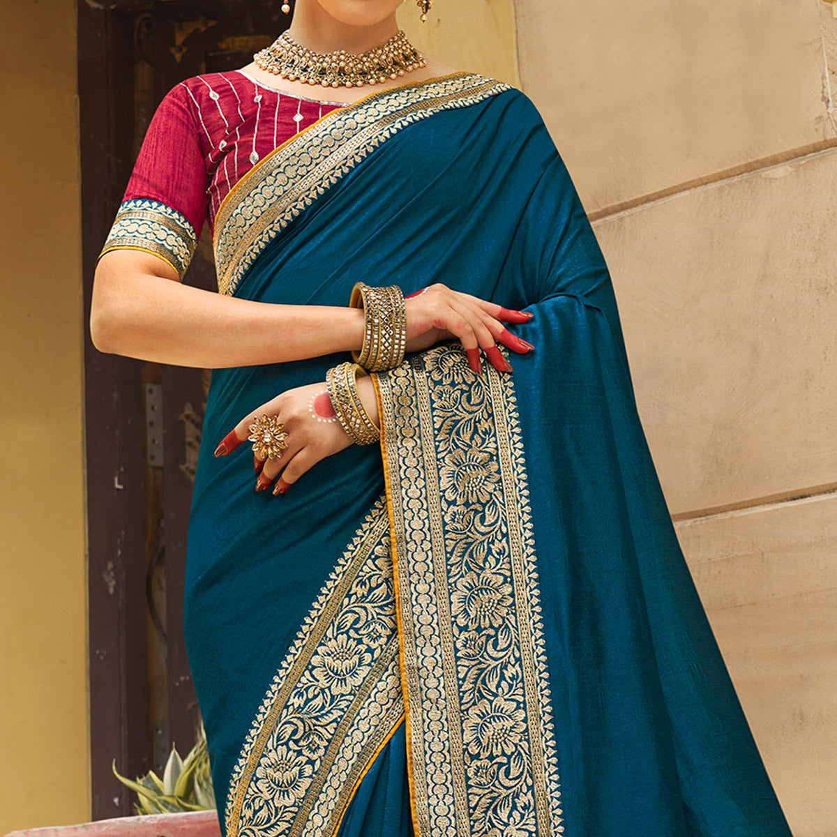 Teal Solid With Embroidered Border Vichitra Silk Saree