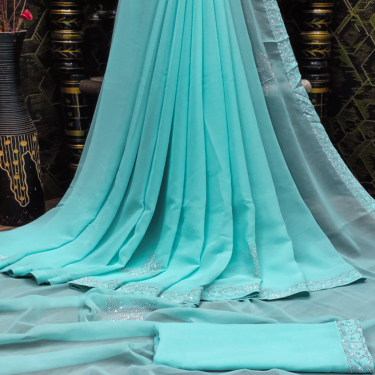 Turquoise Floral Swarovski Work Georgette Saree