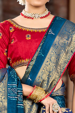 Blue Dola Silk Saree Featuring Artistic Print Work & Graceful Tassel Edging