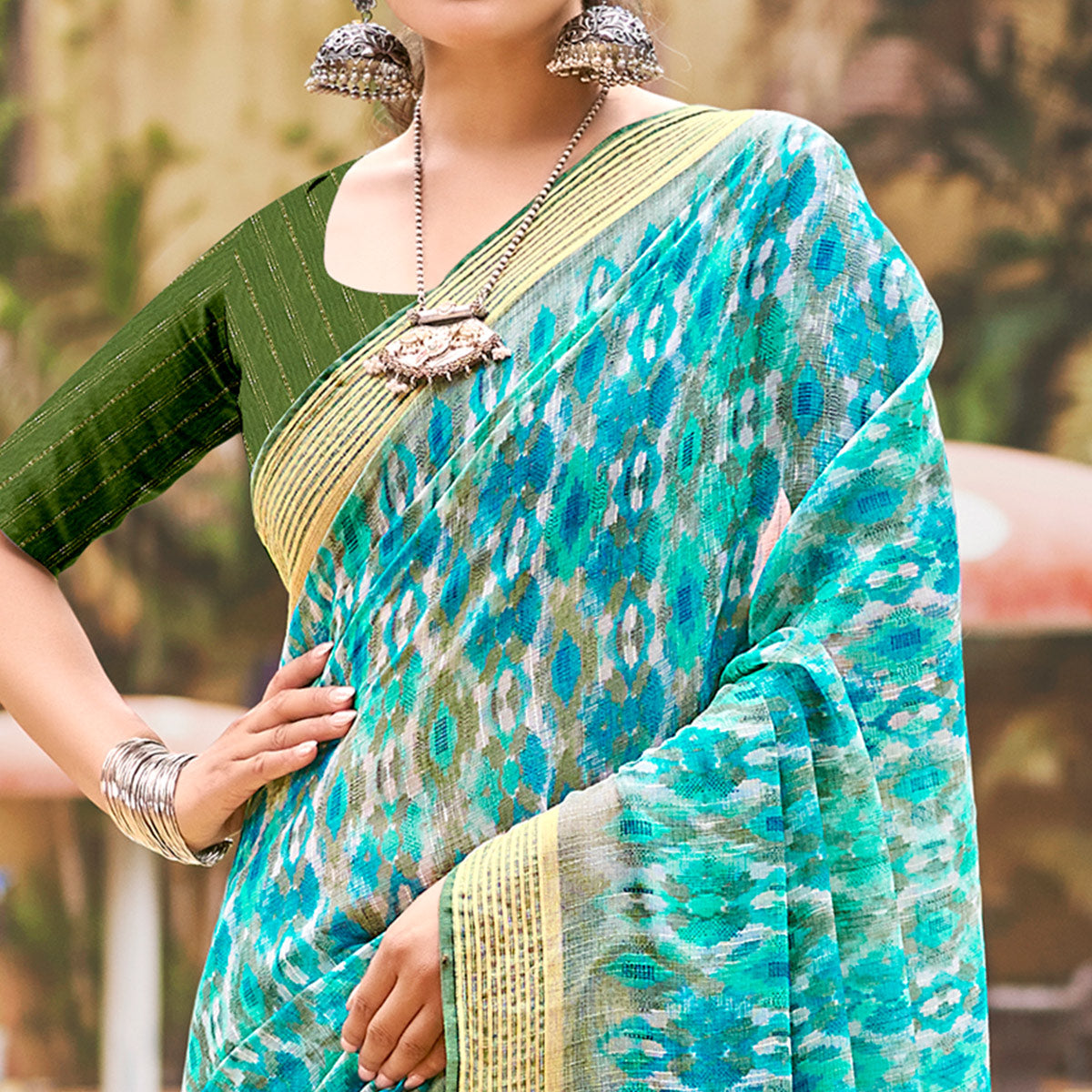 Turquoise Abstract Printed Chiffon Saree