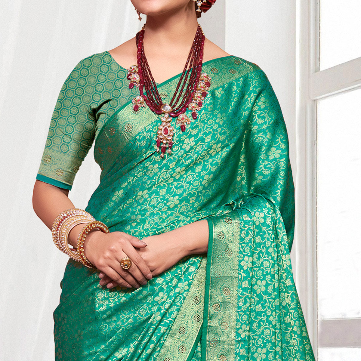 Rama Green Floral Zari Work Pure Silk Saree With Tassels