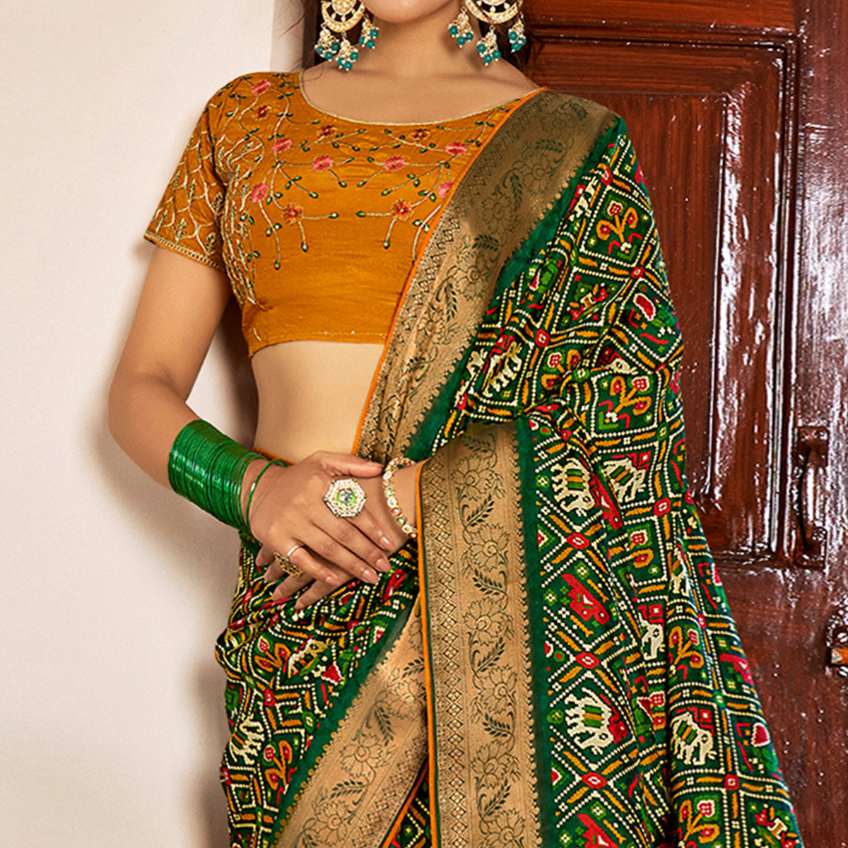 Green Patola Printed Art Silk Saree