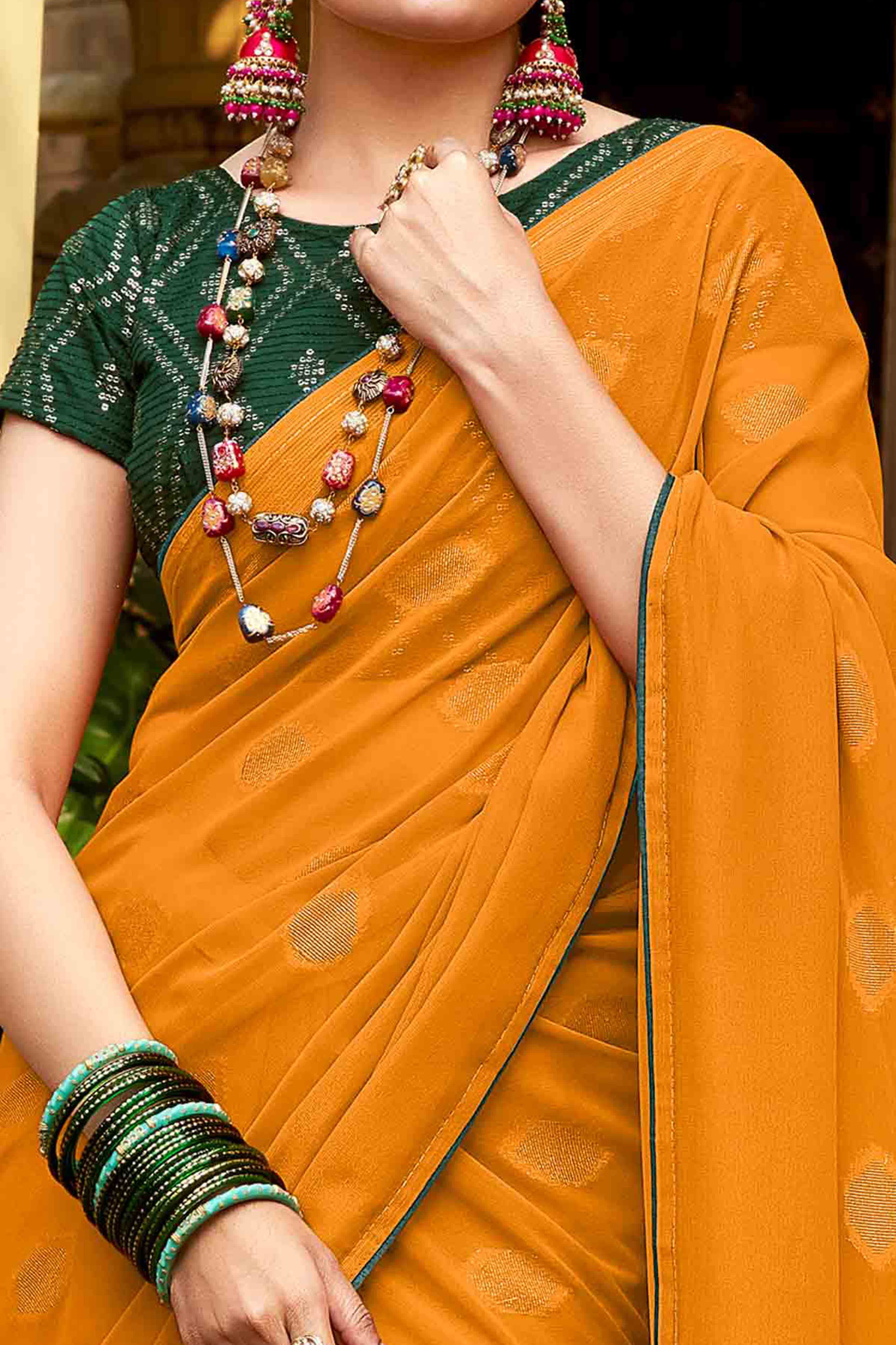 Mustard Woven Georgette Saree With Tassels