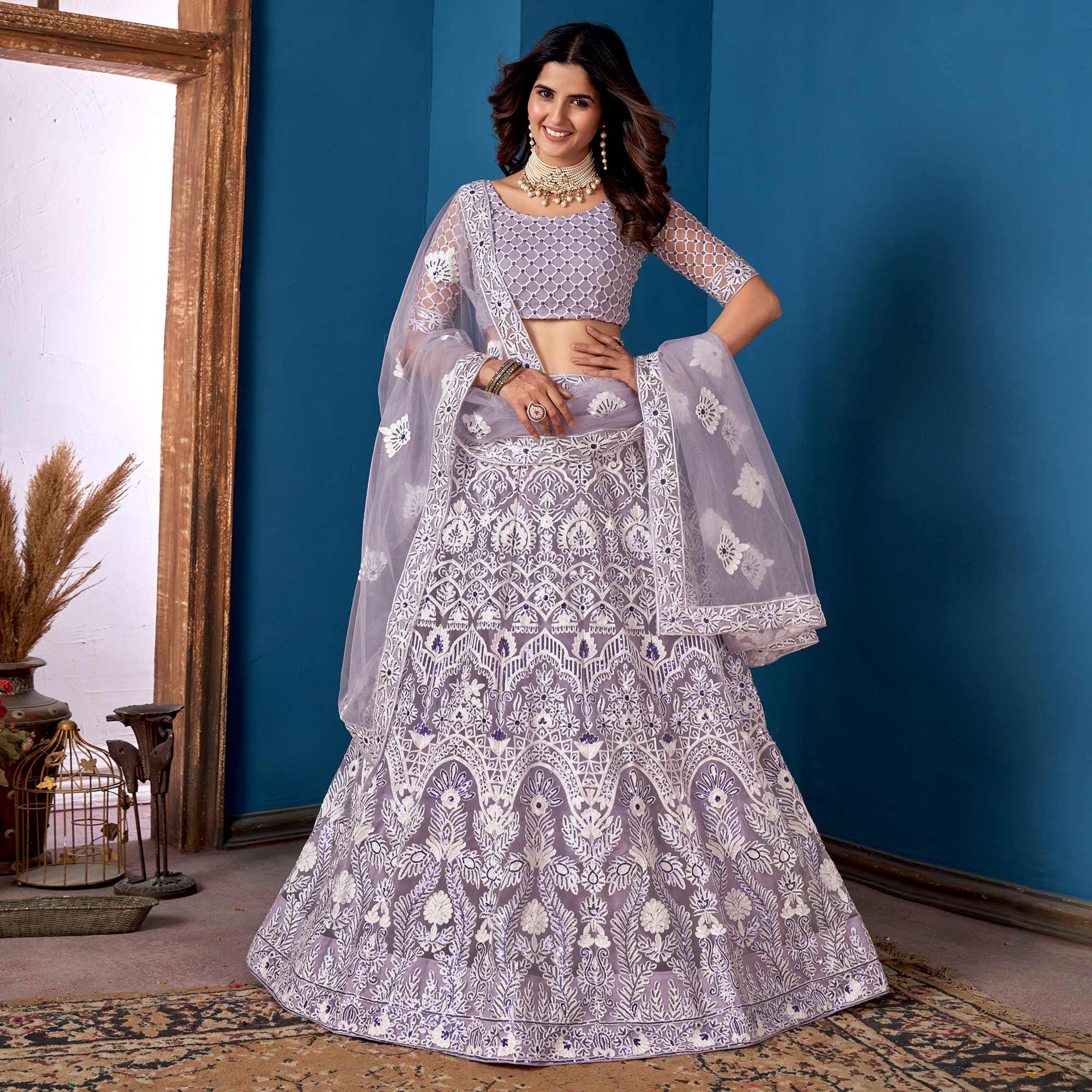 Purple Floral Sequins Embroidered Net Lehenga Choli