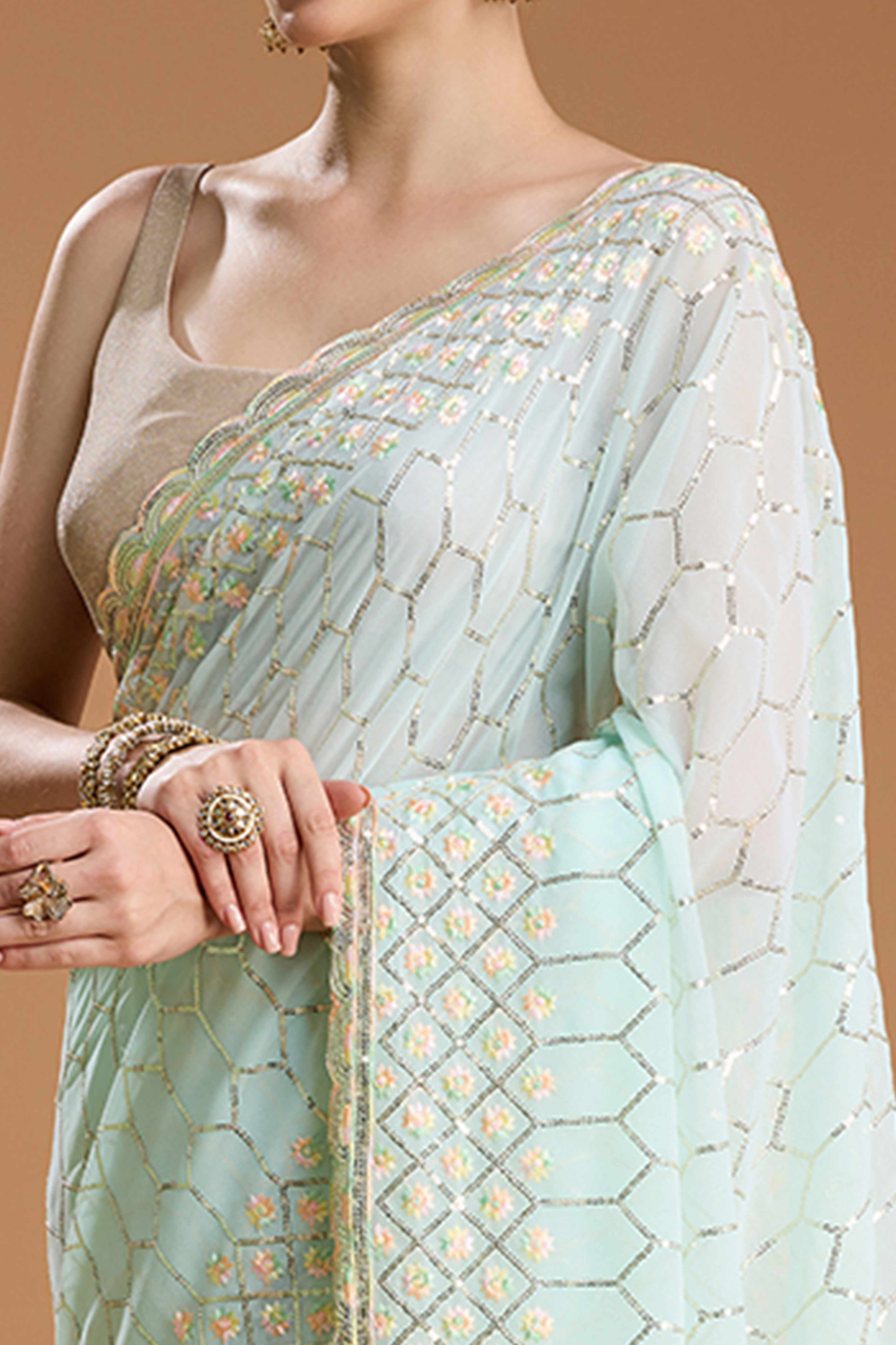 Mint Green Georgette Saree Enhanced with Elegant Sequins Embellishments