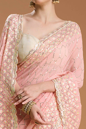 Pastel Peach Georgette Saree Enhanced with Elegant Sequins Embellishments