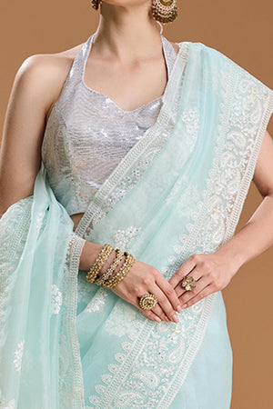 Mint Green Net Saree Enhanced with Elegant Sequins Embellishments