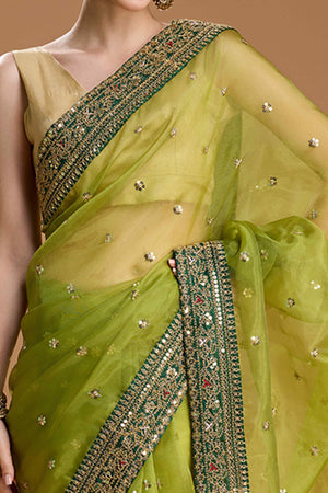 Green Organza Saree Enhanced with Elegant Sequins Embellishments